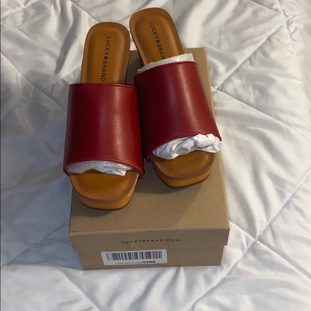 Red slip on clogs